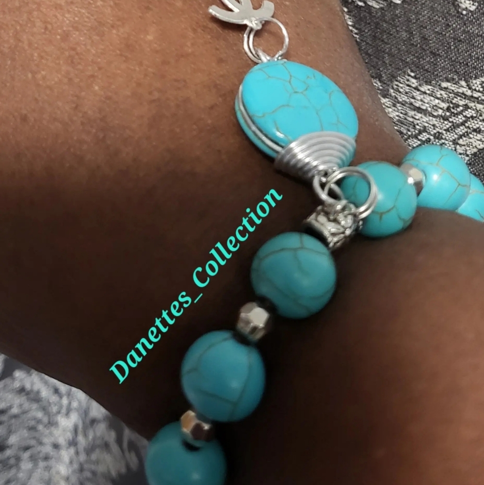Torqouise bracelet with charm.